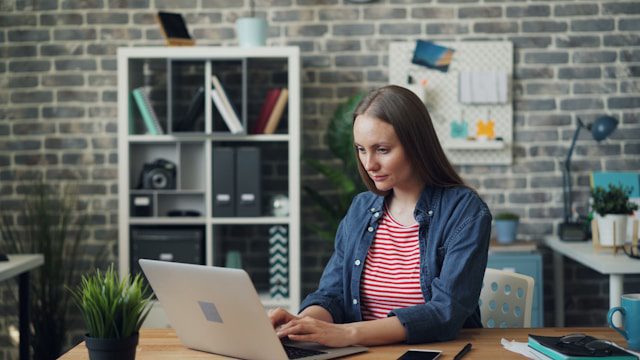 female project manager at desk